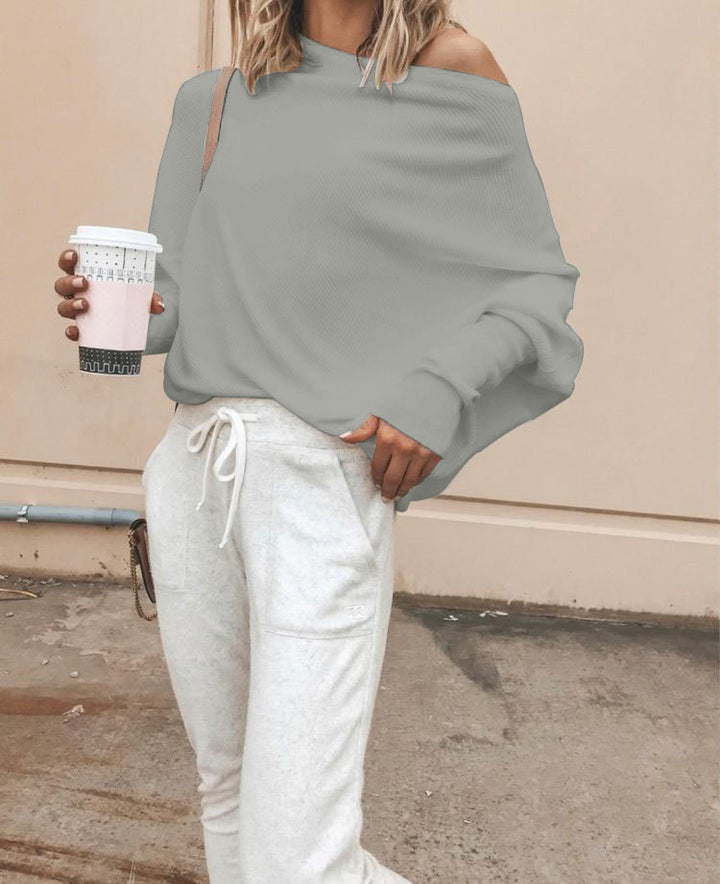 Kvinnors oversized sweatshirt med asymmetrisk halsringning och avslappnad passform Mirla-Eva Jonsson