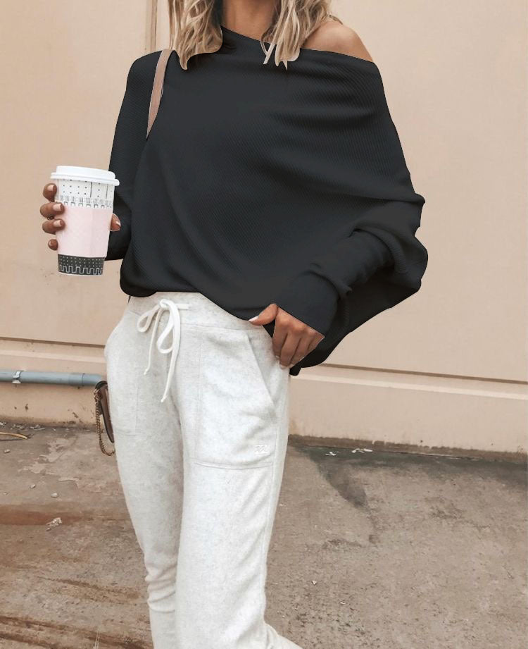 Kvinnors oversized sweatshirt med asymmetrisk halsringning och avslappnad passform Mirla-Eva Jonsson