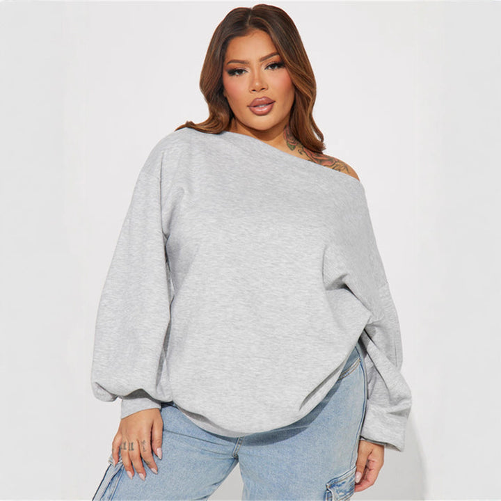 Kvinnors oversized sweatshirt med asymmetrisk halsringning och ballongformade ärmar-Eva Jonsson