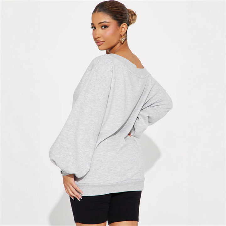 Kvinnors oversized sweatshirt med asymmetrisk halsringning och ballongformade ärmar-Eva Jonsson