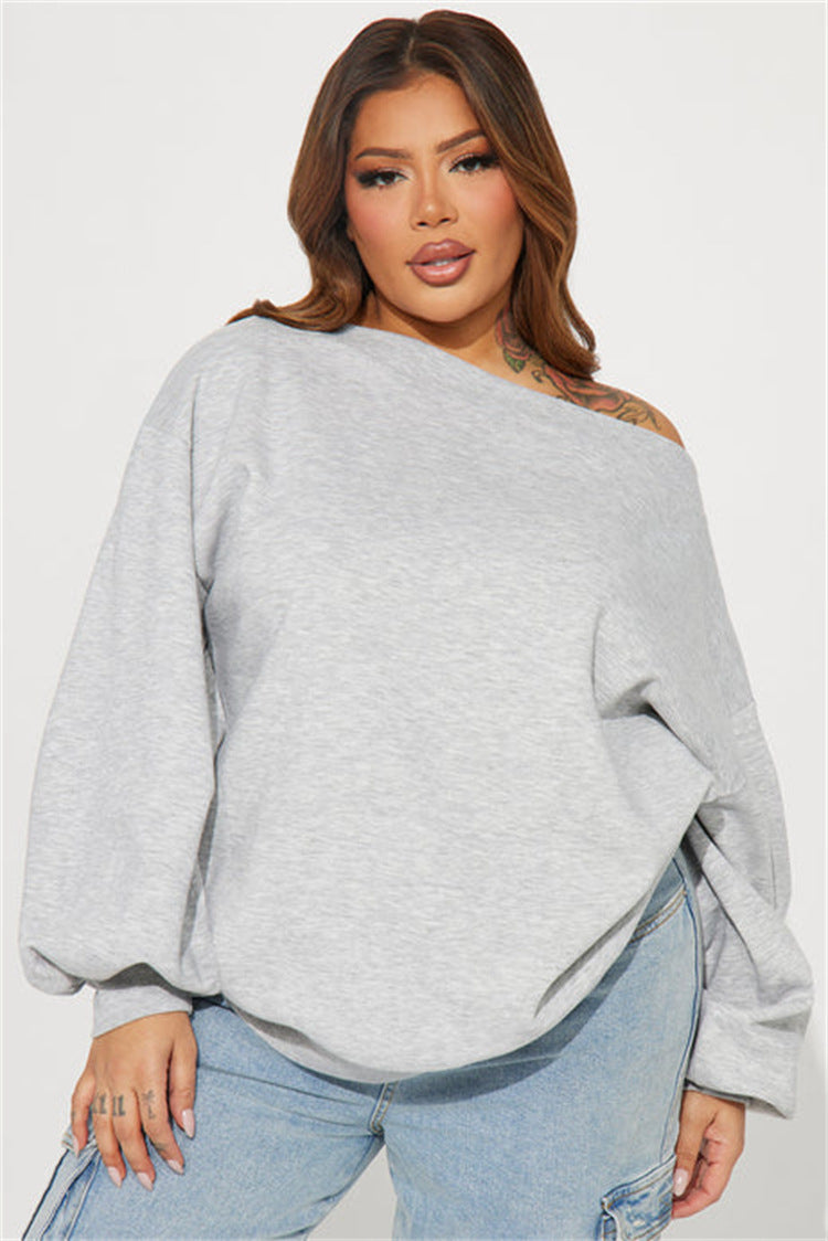 Kvinnors oversized sweatshirt med asymmetrisk halsringning och ballongformade ärmar-Eva Jonsson