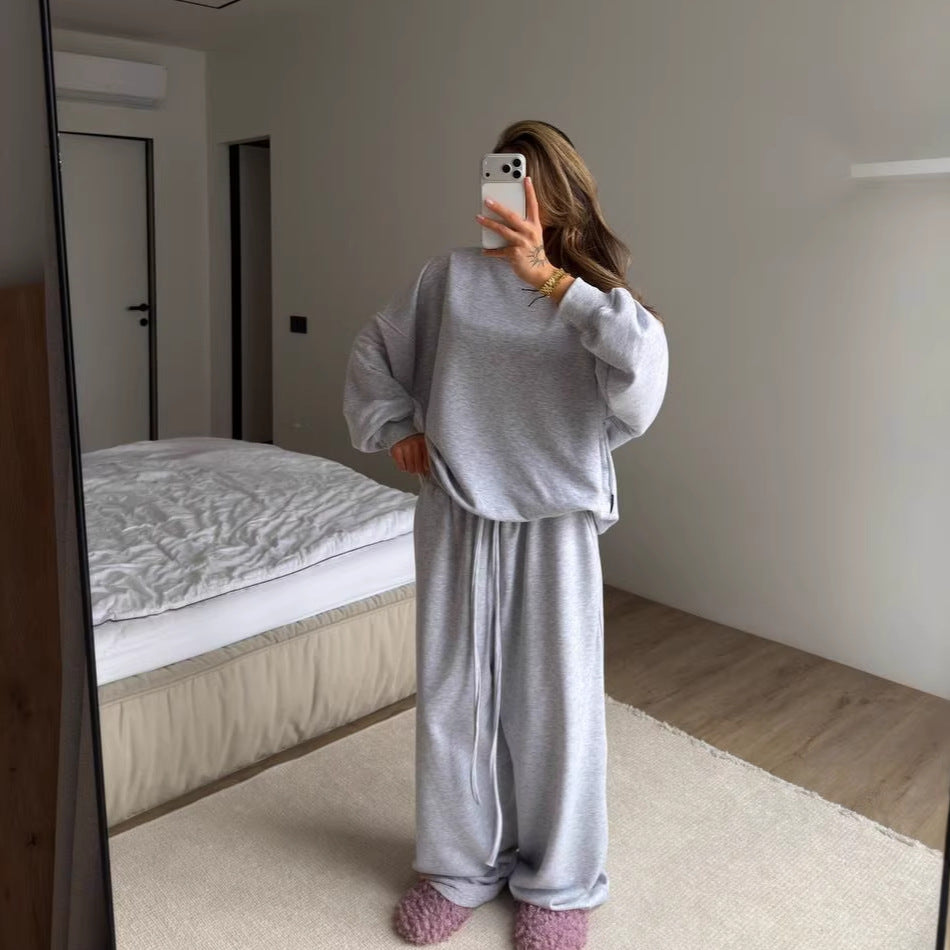 Kvinnors oversized sweatshirt med avslappnad passform och breda manschetter-Eva Jonsson