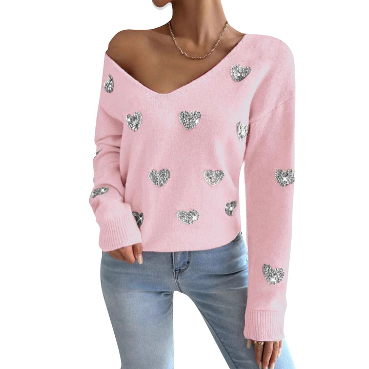 Kvinnors oversized sweatshirt med djup V-hals och hjärtmotiv Mirla-Eva Jonsson