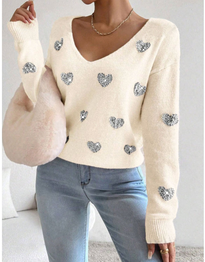 Kvinnors oversized sweatshirt med djup V-hals och hjärtmotiv Mirla-Eva Jonsson