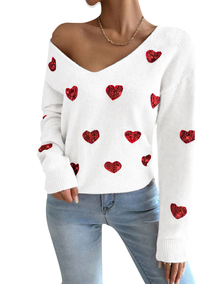 Kvinnors oversized sweatshirt med djup V-hals och hjärtmotiv Mirla-Eva Jonsson