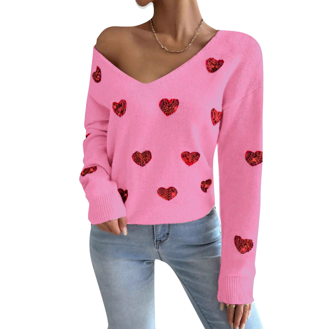 Kvinnors oversized sweatshirt med djup V-hals och hjärtmotiv Mirla-Eva Jonsson