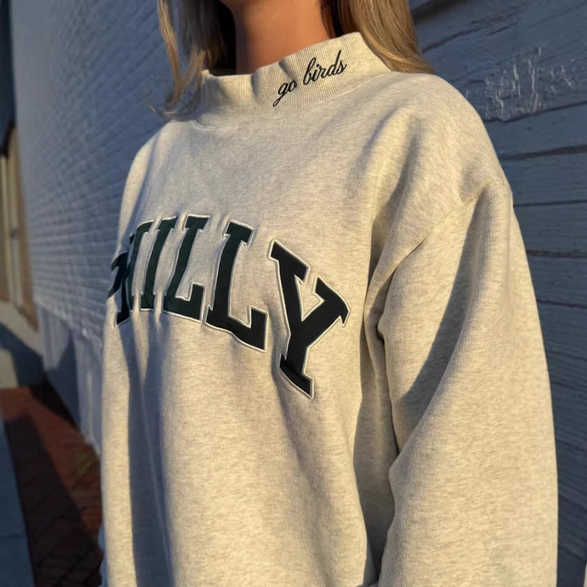 Kvinnors oversized sweatshirt med trendiga bokstäver Mirla-Eva Jonsson