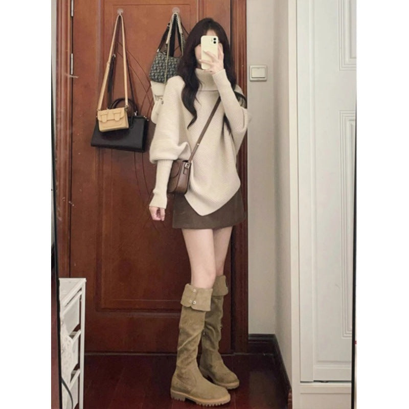 Kvinnors oversized tröja med asymmetrisk fåll Mirla-Eva Jonsson