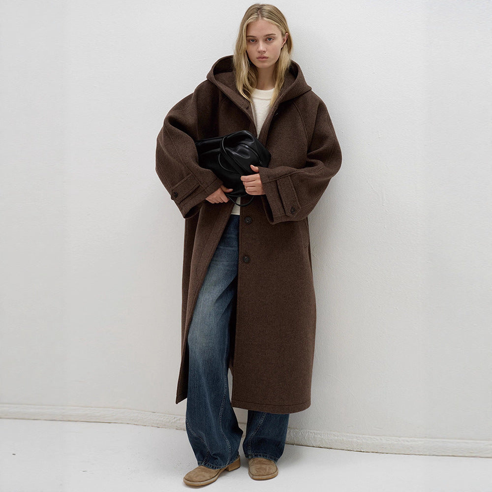 Kvinnors oversized ullkappa med praktisk huva Mirla-Eva Jonsson
