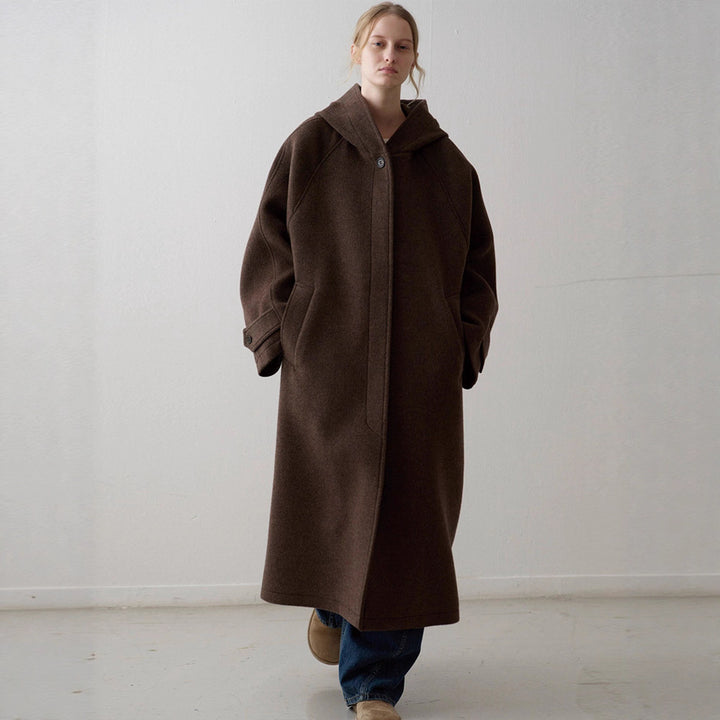 Kvinnors oversized ullkappa med praktisk huva Mirla-Eva Jonsson