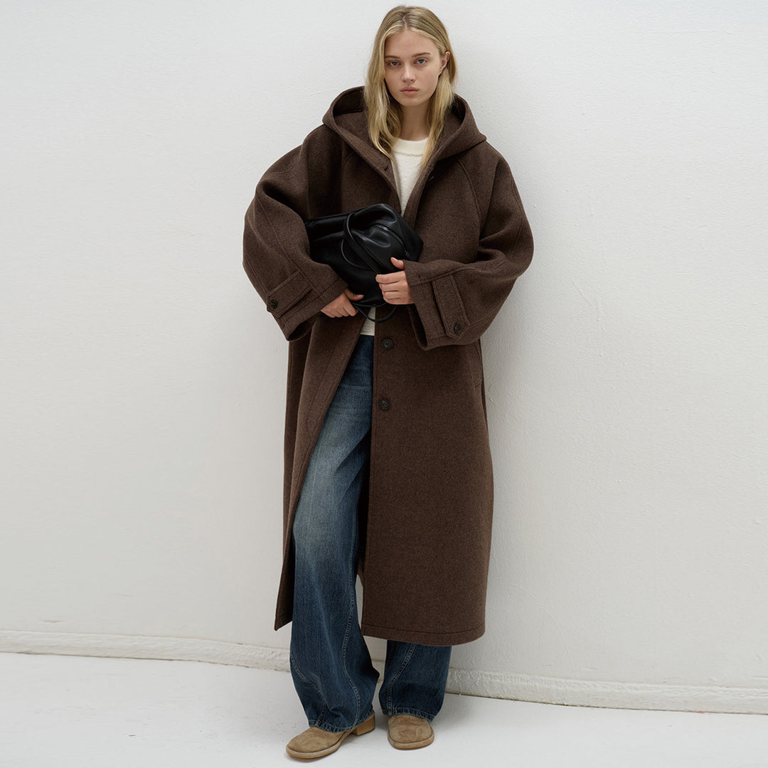 Kvinnors oversized ullkappa med praktisk huva Mirla-Eva Jonsson