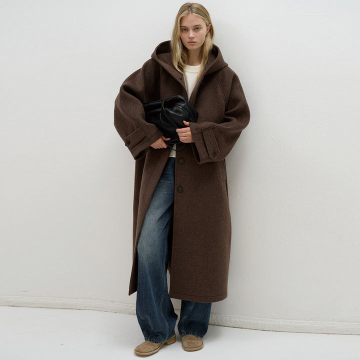 Kvinnors oversized ullkappa med praktisk huva Mirla-Eva Jonsson