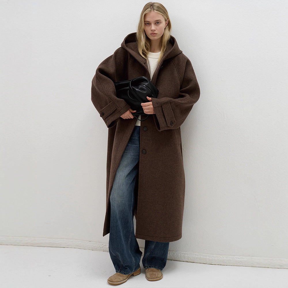 Kvinnors oversized ullkappa med praktisk huva Mirla-Eva Jonsson