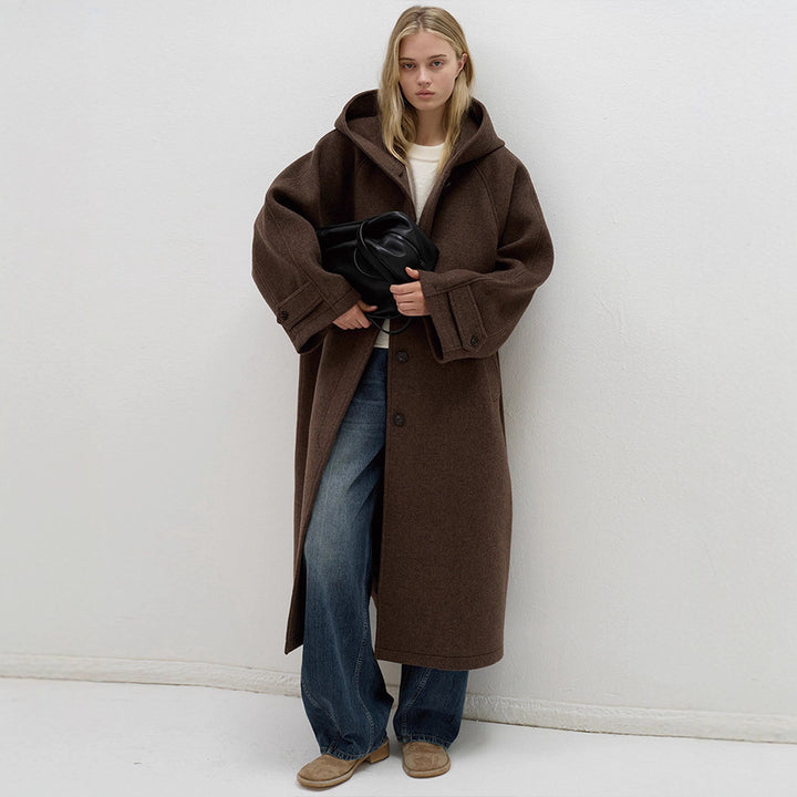 Kvinnors oversized ullkappa med praktisk huva Mirla-Eva Jonsson