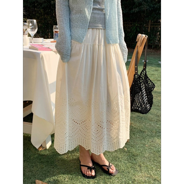 Kvinnors plisserad kjol med smakfullt öljettmönster Mirla-Eva Jonsson