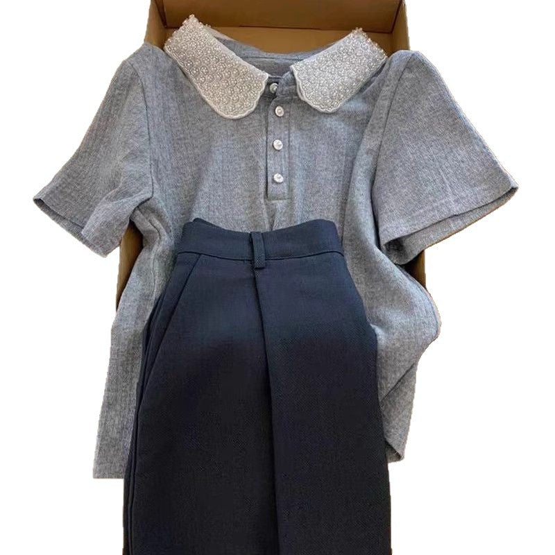 Kvinnors polo topp med elegant krage Mirla-Eva Jonsson