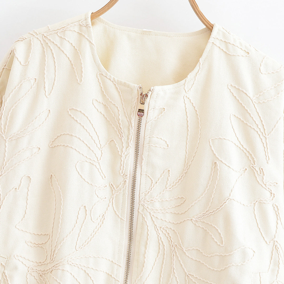 Kvinnors quiltad topp med blommig broderi Mirla-Eva Jonsson