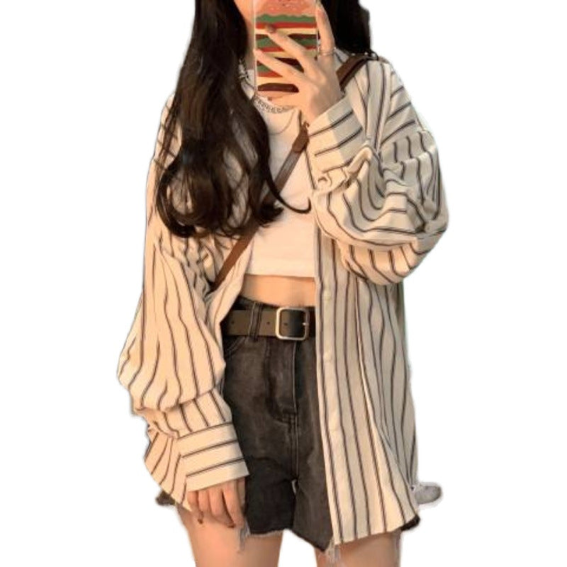 Kvinnors randig overshirt-blus i avslappnad passform med oversized ärmar-Eva Jonsson