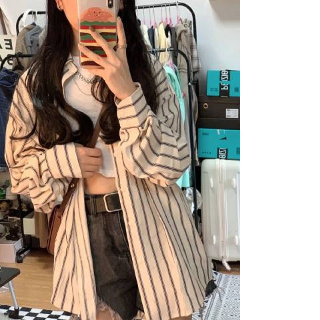 Kvinnors randig overshirt-blus i avslappnad passform med oversized ärmar-Eva Jonsson