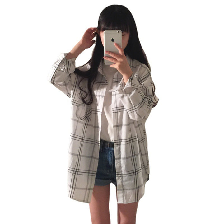 Kvinnors randig overshirt-blus i avslappnad passform med oversized ärmar-Eva Jonsson