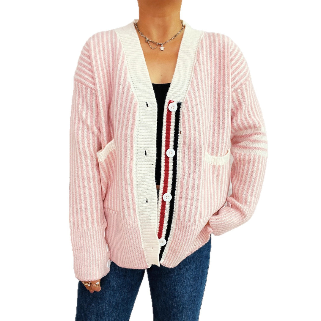 Kvinnors randig stickad cardigan med fickor och knapppdetaljer Mirla-Eva Jonsson
