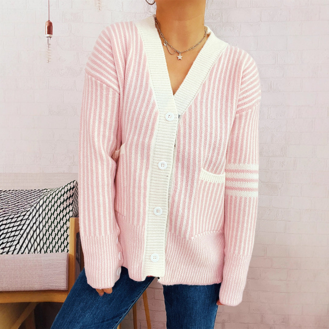 Kvinnors randig stickad cardigan med fickor och knapppdetaljer Mirla-Eva Jonsson