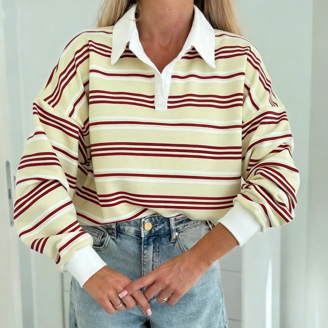 Kvinnors randiga polo sweatshirt med kontrasterande krage och oversized passform Mirla-Eva Jonsson