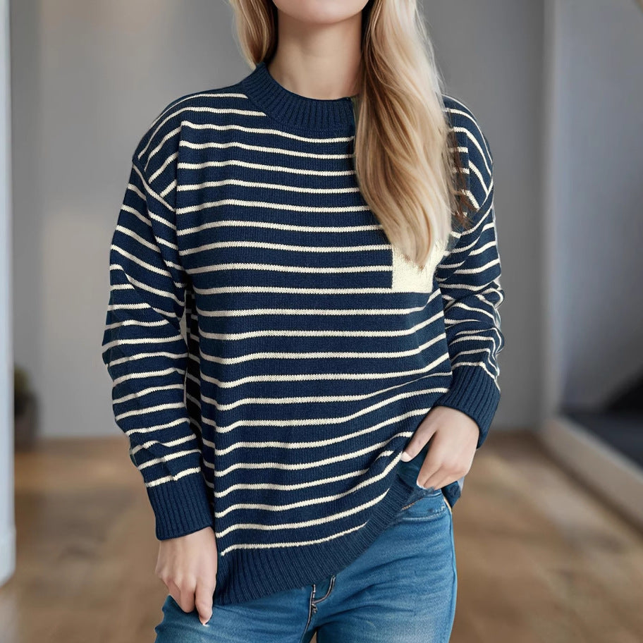 Kvinnors randiga tröja med en avslappnad passform och vida ärmar Mirla-Eva Jonsson