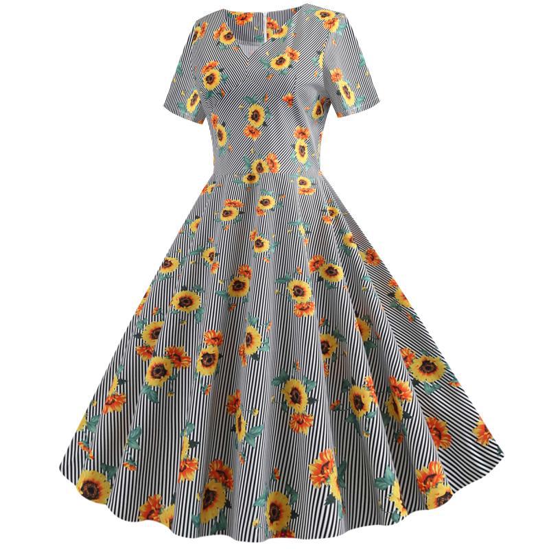 Kvinnors retro svängklänning med blommigt solrosmönster och skräddarsydd passform Mirla-Eva Jonsson