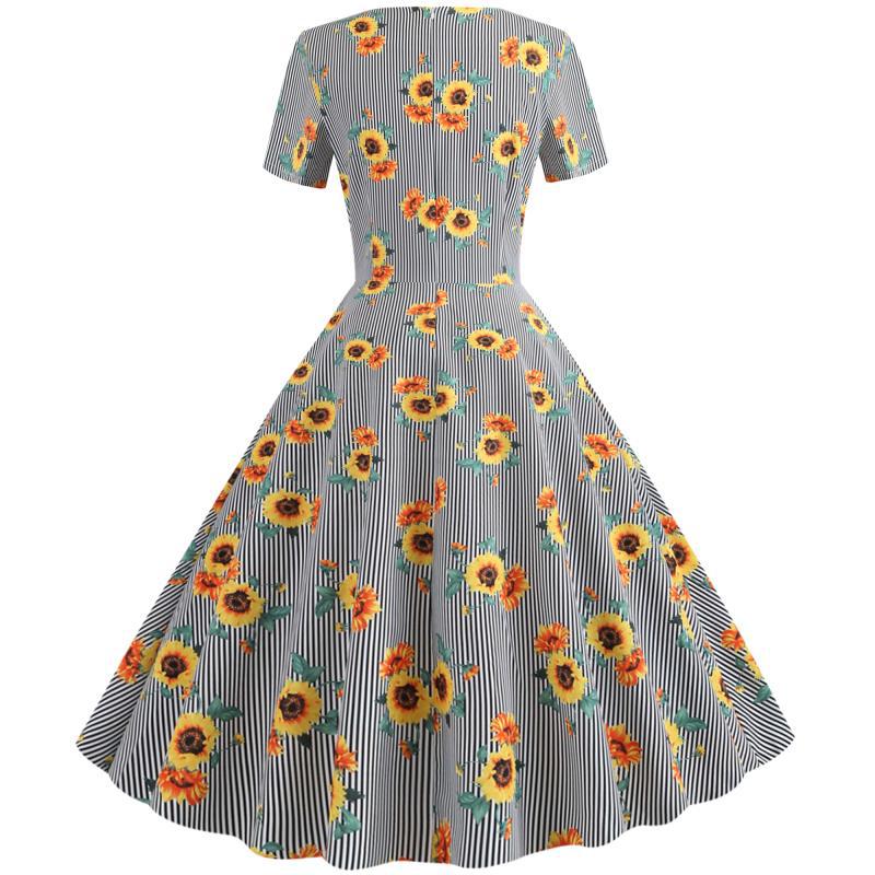 Kvinnors retro svängklänning med blommigt solrosmönster och skräddarsydd passform Mirla-Eva Jonsson
