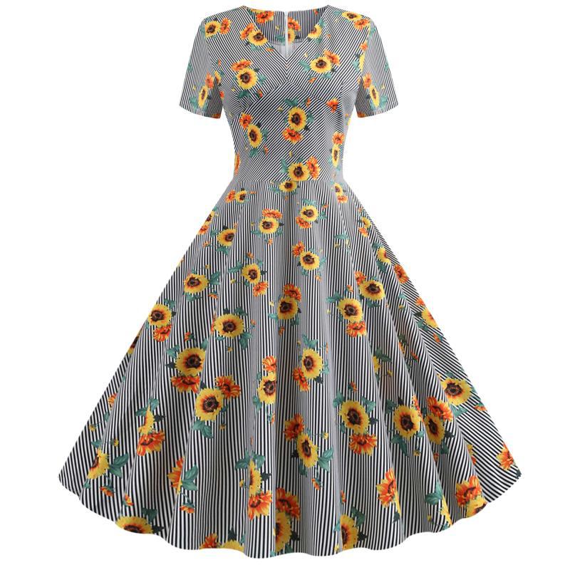 Kvinnors retro svängklänning med blommigt solrosmönster och skräddarsydd passform Mirla-Eva Jonsson
