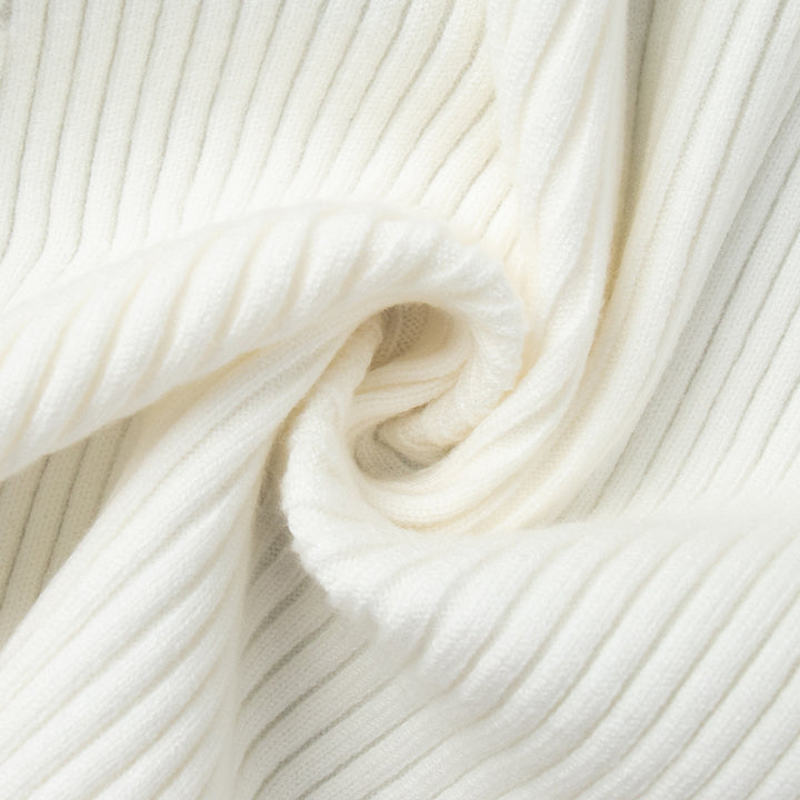 Kvinnors ribbad stickad pullover gjord av mjuk bomullsblandning med elegant snitt Mirla-Eva Jonsson