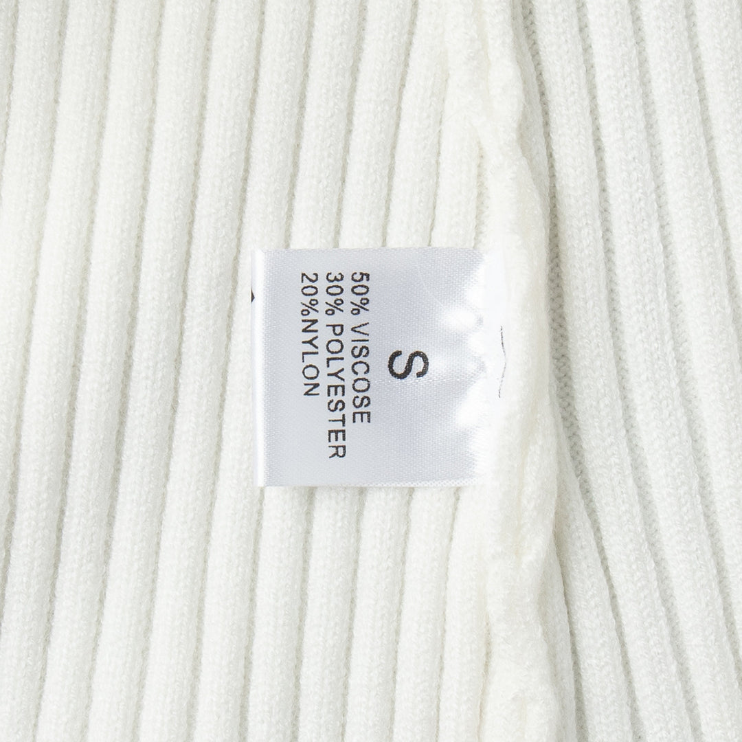 Kvinnors ribbad stickad pullover gjord av mjuk bomullsblandning med elegant snitt Mirla-Eva Jonsson
