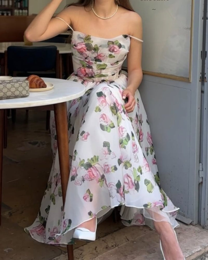 Kvinnors semitransparenta kvällsklänning med blommönster och band Mirla-Eva Jonsson