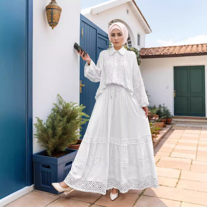 Kvinnors set av blommigt broderad blus och maxikjolar Mirla-Eva Jonsson