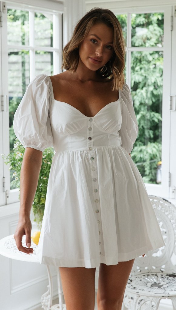 Kvinnors skandinaviska sommarklänning med puffärmar och knapplist Mirla-Eva Jonsson