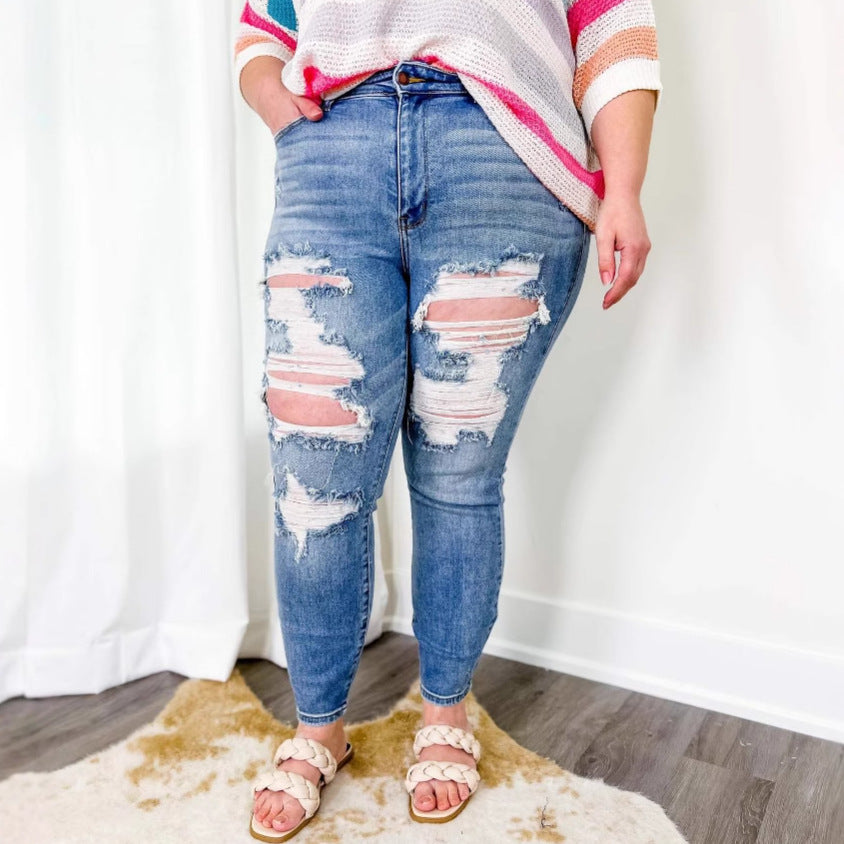 Kvinnors skinny jeans med trendigt förstört utseende och elastisk midja Mirla-Eva Jonsson