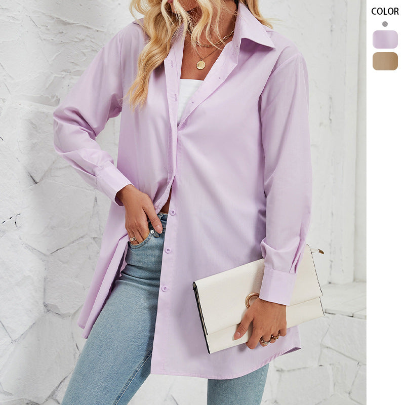 Kvinnors skjorta blus med en elegant oversized passform och klassiska knapprinor Mirla-Eva Jonsson