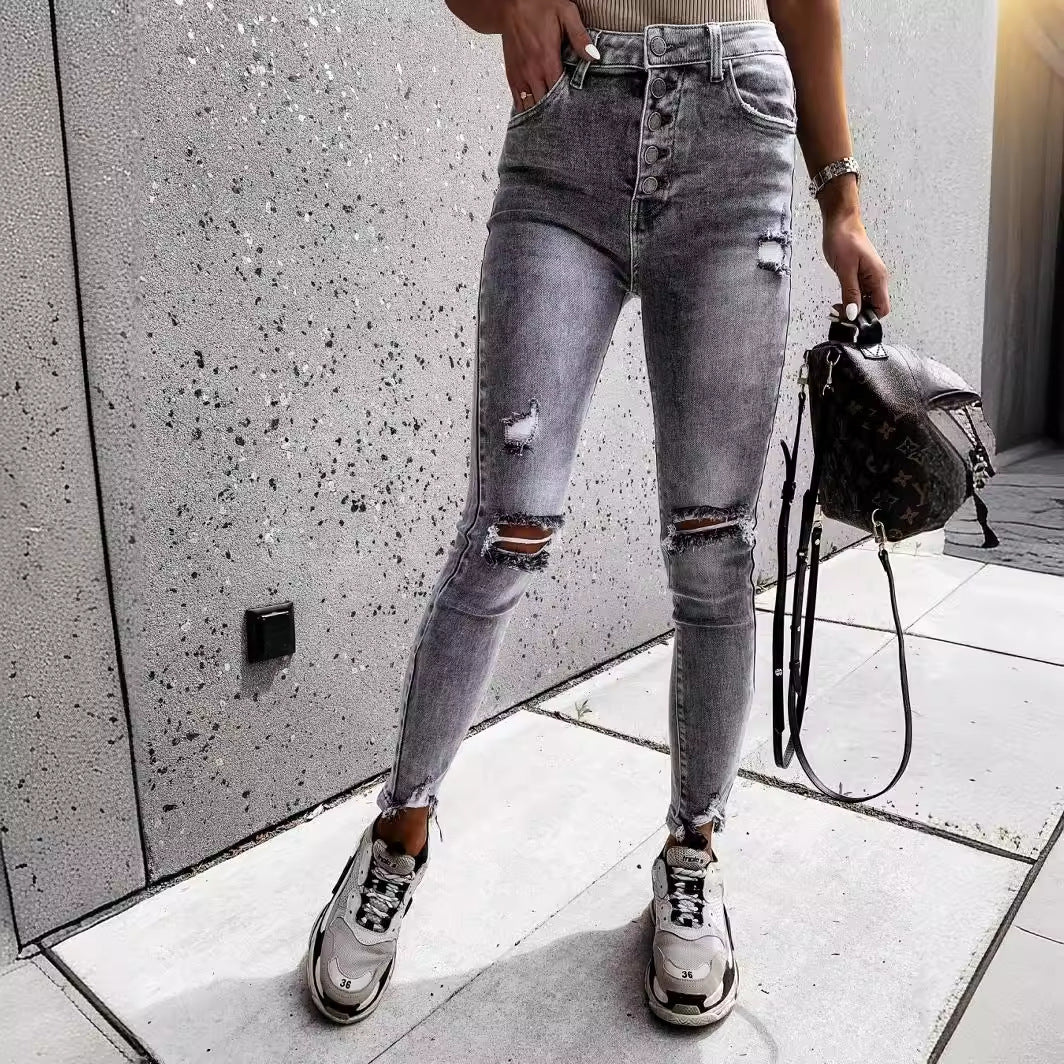 Kvinnors smaljeans med höga fickor och trendiga slitna detaljer Mirla-Eva Jonsson