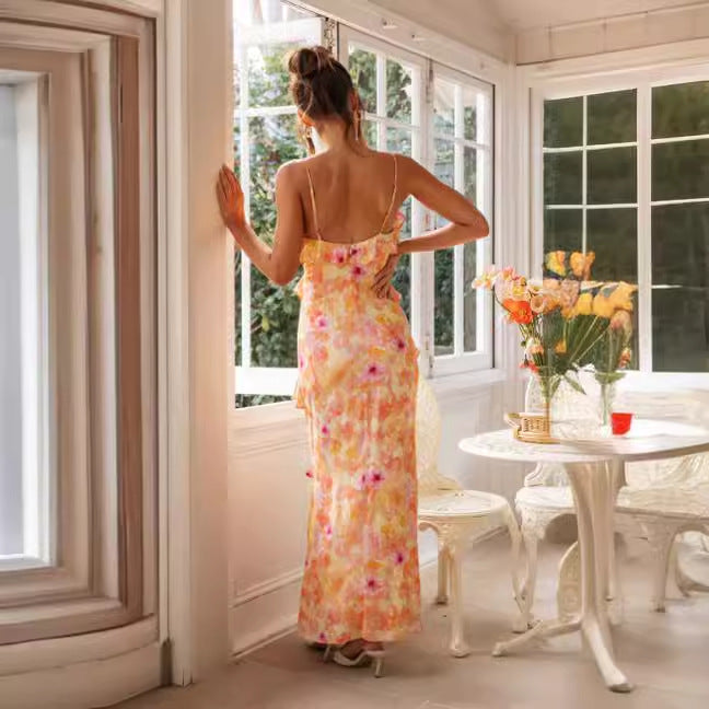 Kvinnors sommar maxi klänning med volangdetaljer och delikat blommönster Mirla-Eva Jonsson
