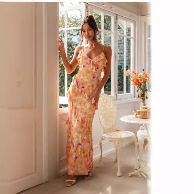 Kvinnors sommar maxi klänning med volangdetaljer och delikat blommönster Mirla-Eva Jonsson