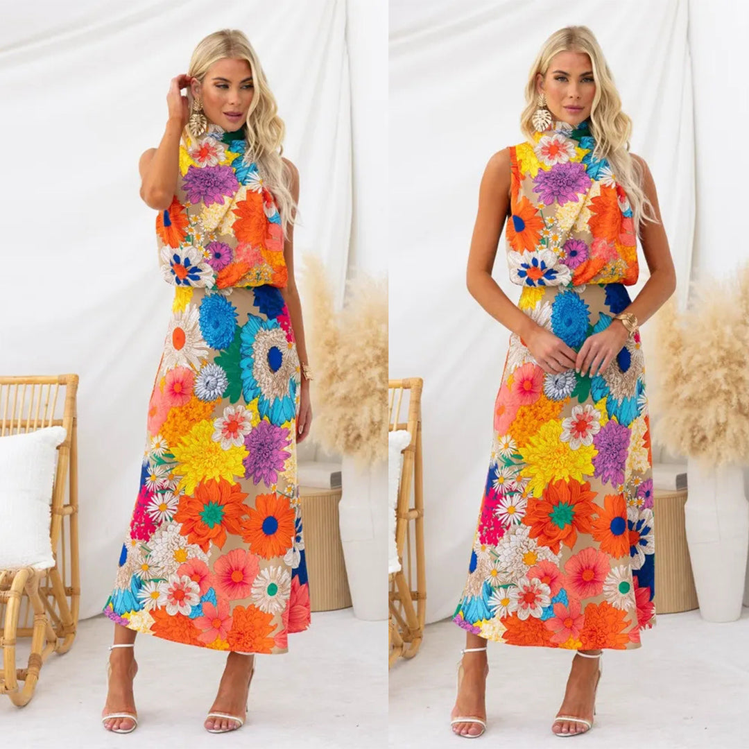 Kvinnors sommar maxiklänning med blommiga accenter och elegant snitt-Eva Jonsson
