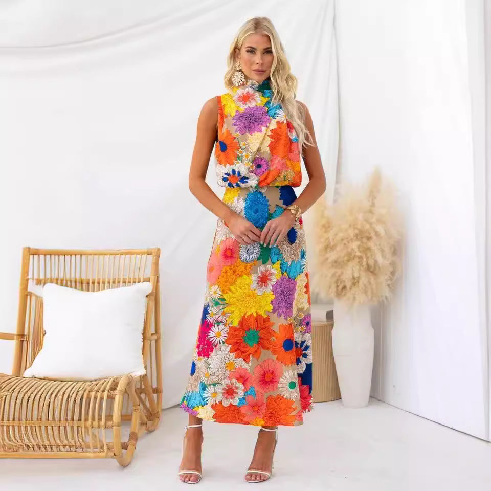 Kvinnors sommar maxiklänning med blommiga accenter och elegant snitt-Eva Jonsson