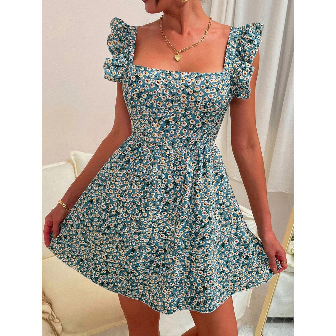 Kvinnors sommardress med rufflesdetaljer och fyrkantig halsringning Mirla-Eva Jonsson