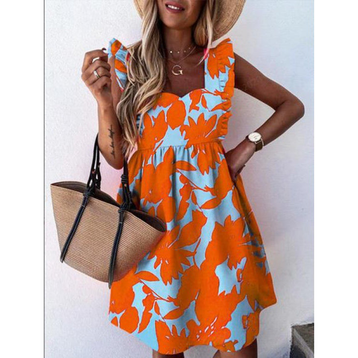 Kvinnors sommardress med volangdetaljer och blommönster Mirla-Eva Jonsson