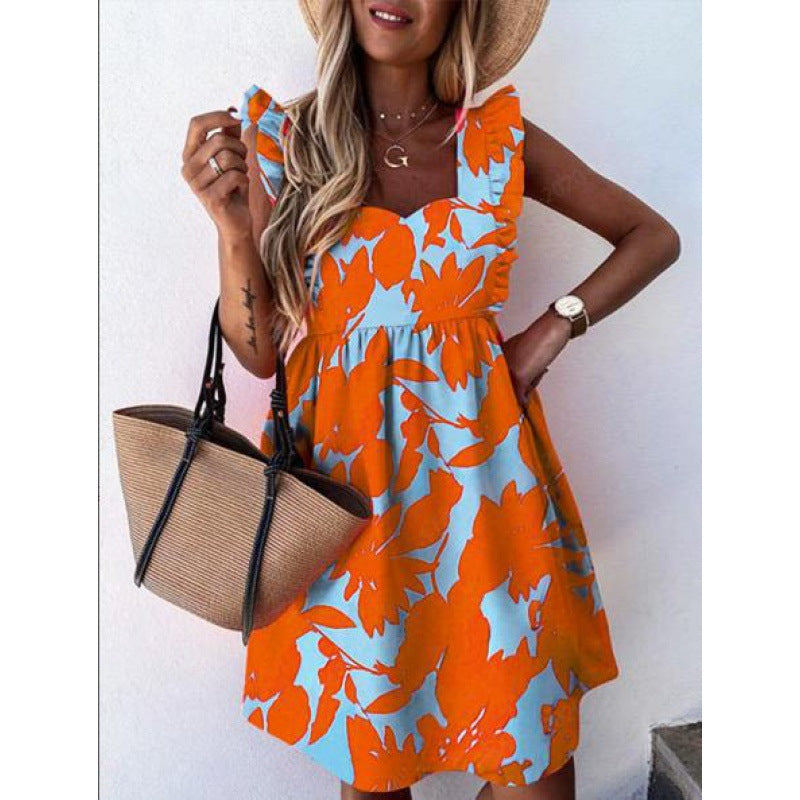 Kvinnors sommardress med volangdetaljer och blommönster Mirla-Eva Jonsson