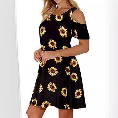 Kvinnors sommarklänning med blommönster och off-shoulder skärning Mirla-Eva Jonsson