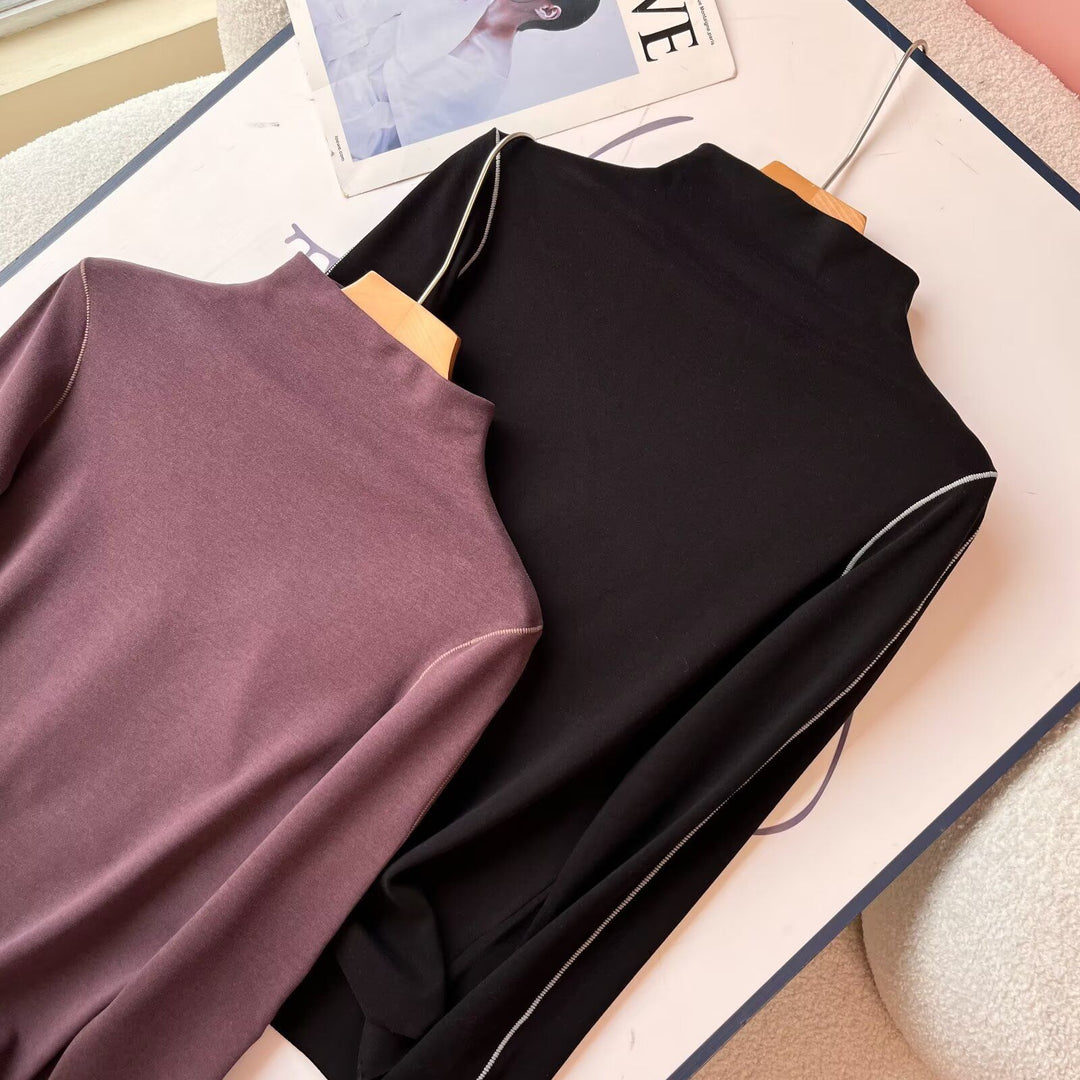 Kvinnors sportig långärmad polo skjorta med elegant kragelösning Mirla-Eva Jonsson