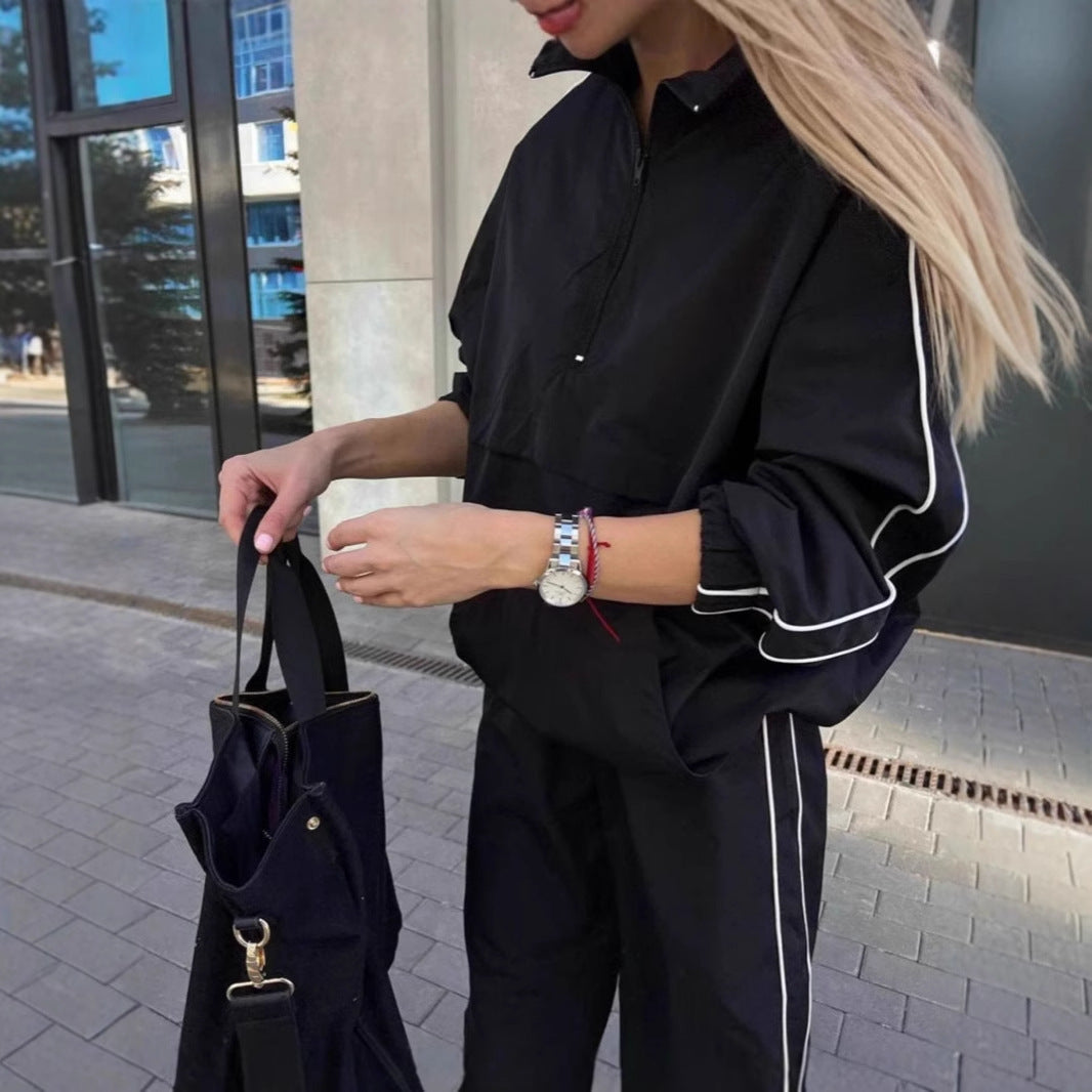 Kvinnors sportig vindjacka med halv dragkedja och elastisk ärm Mirla-Eva Jonsson