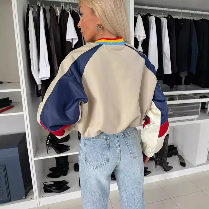 Kvinnors sportiga bomberjacka med färgblockdesign och elastiska muddar Mirla-Eva Jonsson
